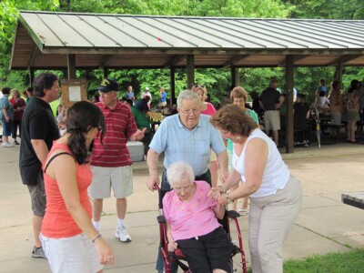 Center: Howard Pease and Bernadette Grace-Pease, Joanne Konstantas-Sebeck on right